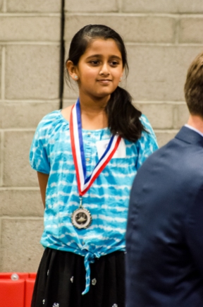 Tanvi and her bronze medal in Speech. "I - WANT - MY - APPLE JUICE!"