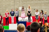 Hailey receiving her gold medal in English Grammar.